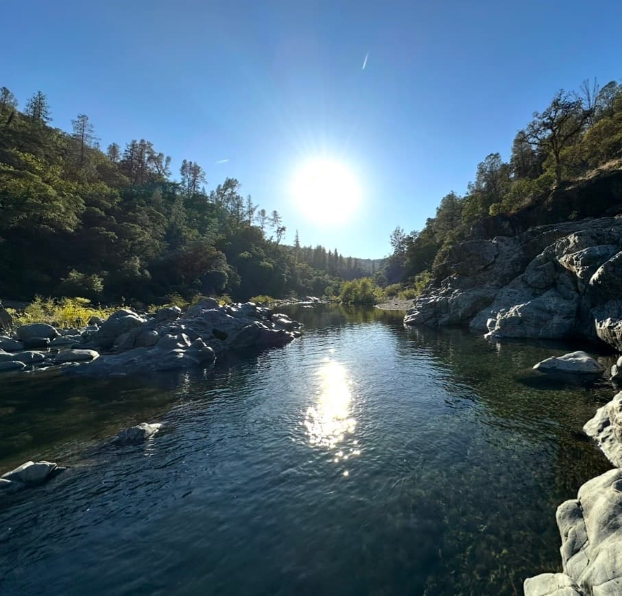 The Yuba River running through granite and forest below our farm
